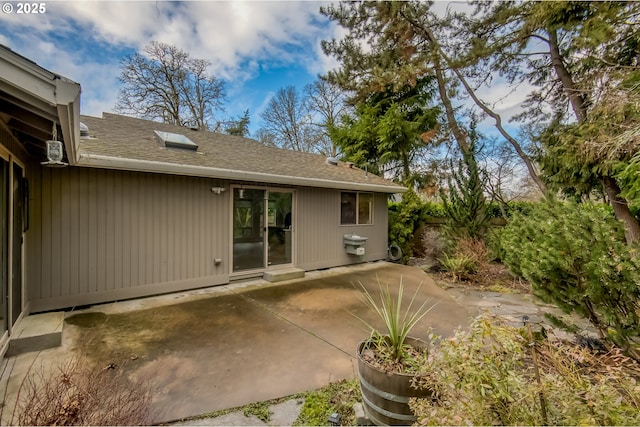 back of property featuring a patio area