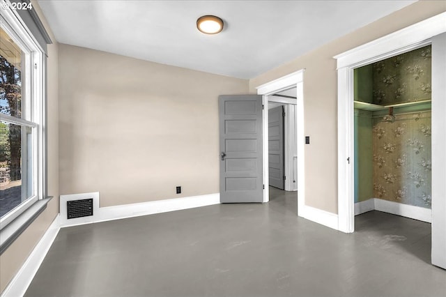 unfurnished bedroom with a closet