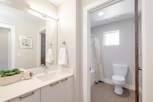 full bathroom featuring shower / bath combination with curtain, vanity, and toilet