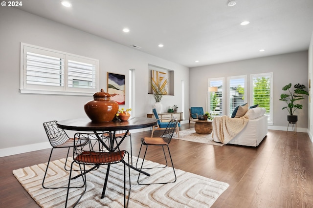 living room featuring dark hardwood / wood-style flooring