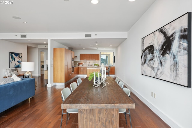 dining room featuring dark wood-type flooring