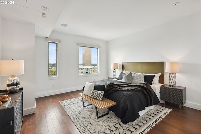 bedroom featuring dark wood-type flooring