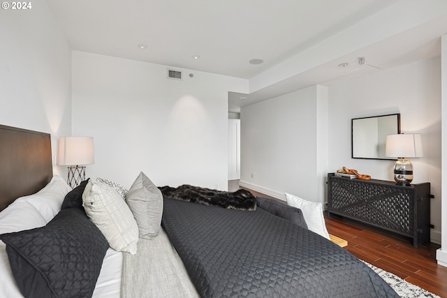 bedroom featuring dark hardwood / wood-style floors