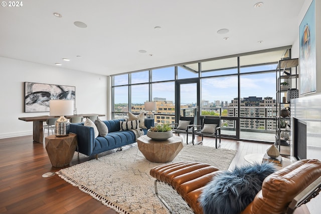 living room with expansive windows and wood-type flooring