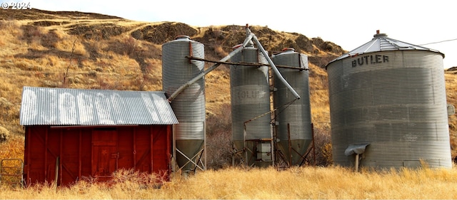 view of side of home with an outbuilding