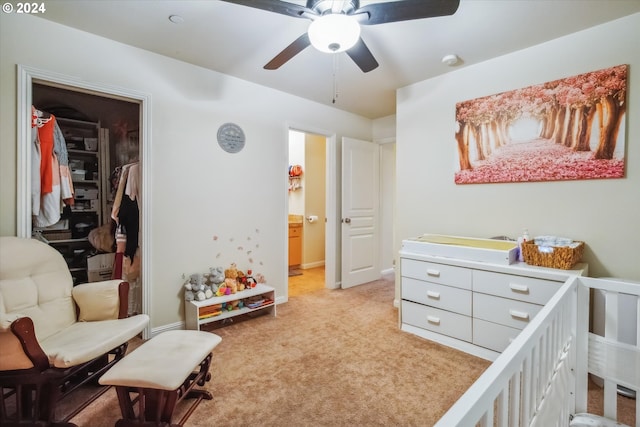 carpeted bedroom with ceiling fan