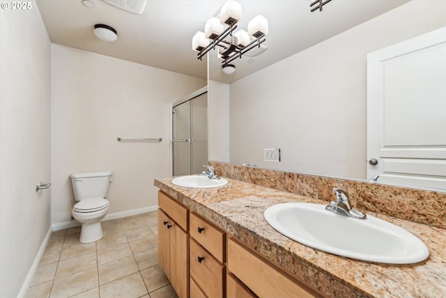 bathroom with vanity, a shower with shower door, tile patterned floors, toilet, and a chandelier