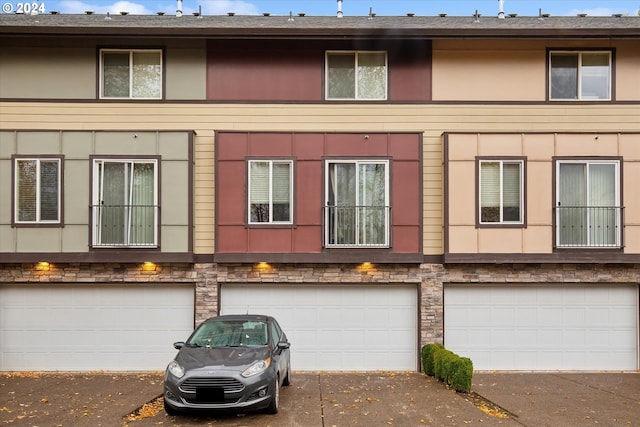 view of front of home with a garage