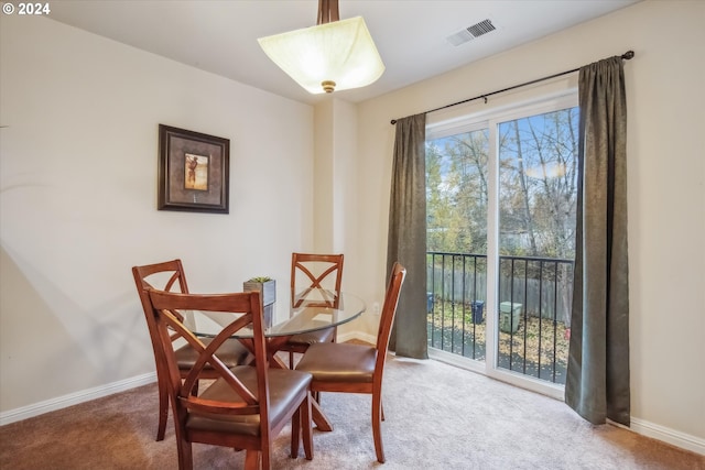 view of carpeted dining room