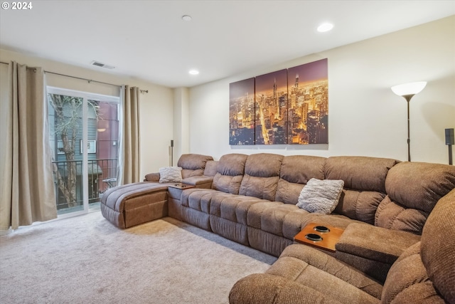 living room featuring light carpet