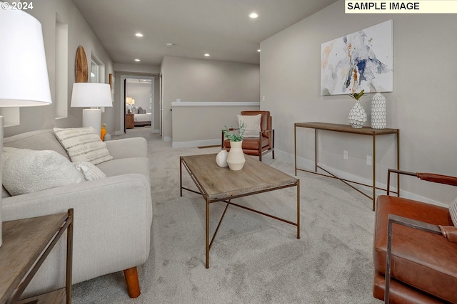 living room featuring light colored carpet