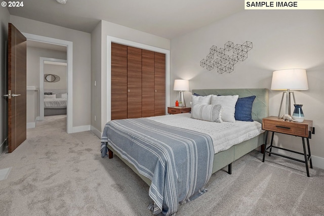 bedroom with carpet floors and a closet