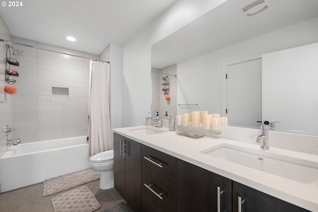 full bathroom with tile patterned floors, vanity, toilet, and shower / bathtub combination with curtain