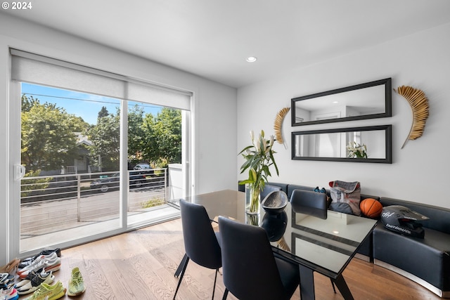 dining area with hardwood / wood-style flooring