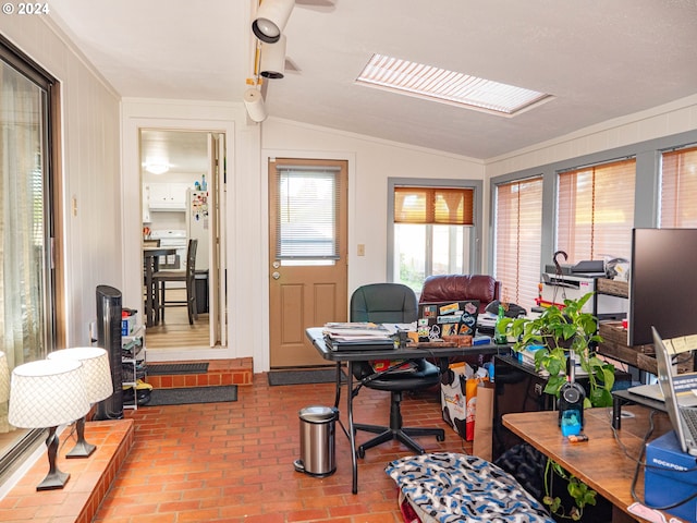 office space featuring vaulted ceiling