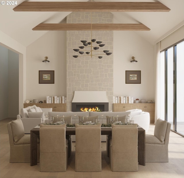 dining room with a large fireplace, beamed ceiling, high vaulted ceiling, and hardwood / wood-style flooring