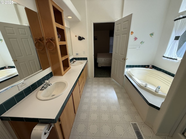 2647 S Tenmile, Lakeside, OR 97449 - full bath featuring tile patterned floors, double vanity, and a bath