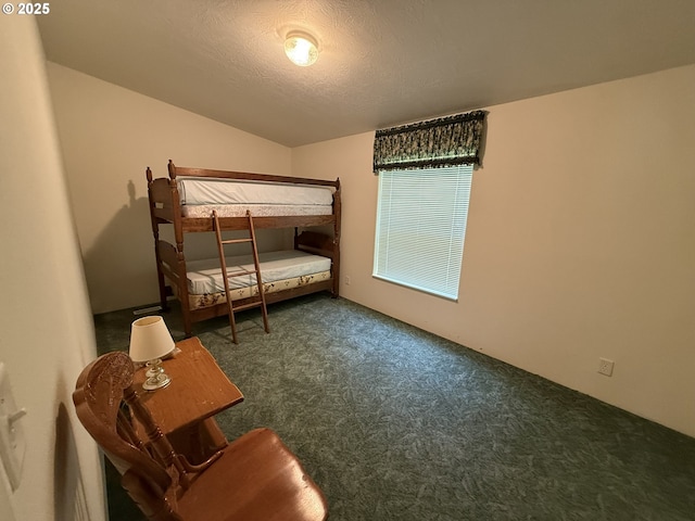 2647 S Tenmile, Lakeside, OR 97449 - carpeted bedroom featuring a textured ceiling