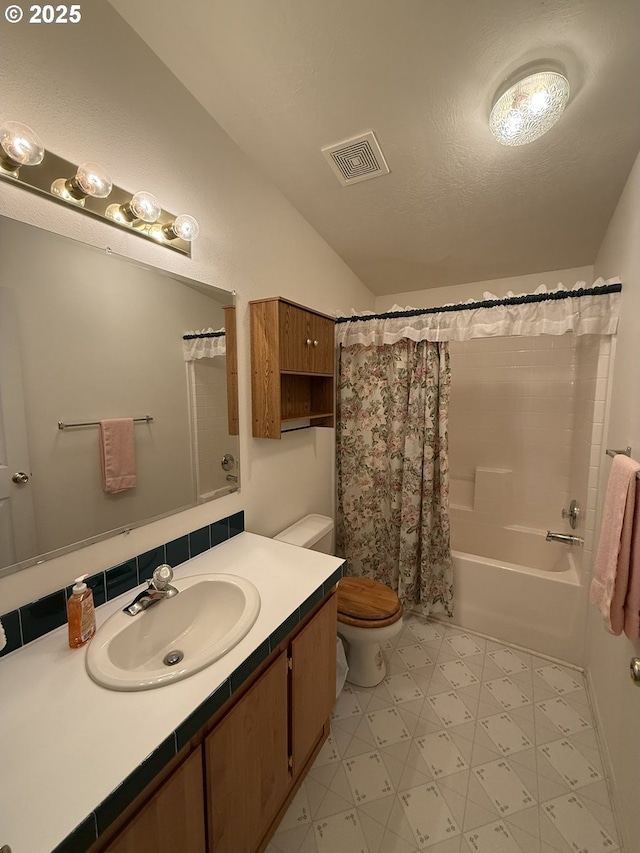 2647 S Tenmile, Lakeside, OR 97449 - full bathroom featuring vanity, toilet, shower / bath combination with curtain, vaulted ceiling, and tile patterned floors