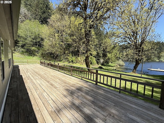 2647 S Tenmile, Lakeside, OR 97449 - wooden terrace with a water view and a yard