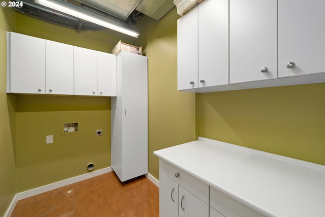 laundry room featuring washer hookup, hookup for an electric dryer, and cabinets