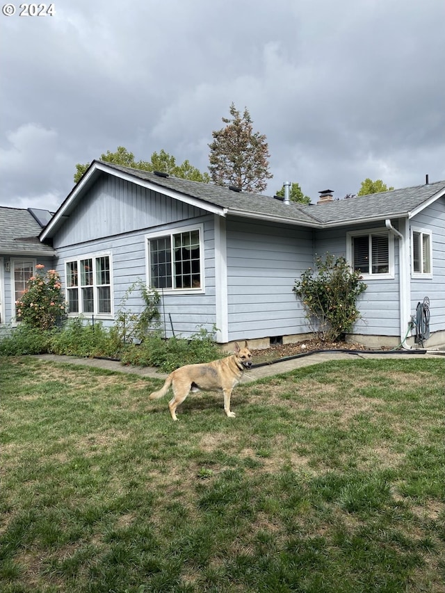 exterior space with a yard