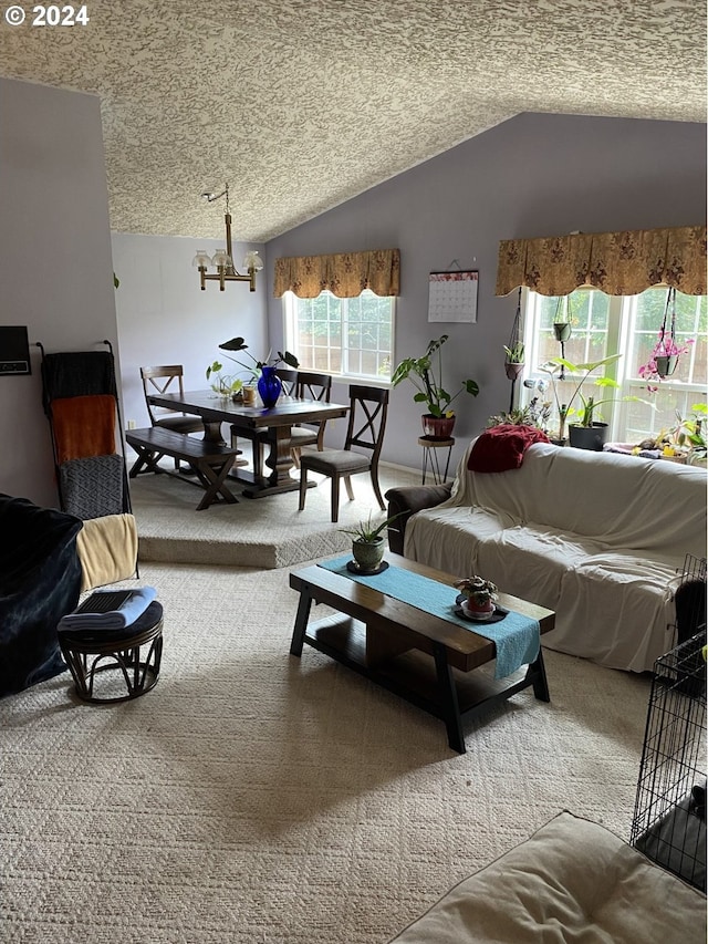 carpeted living room featuring vaulted ceiling and a textured ceiling