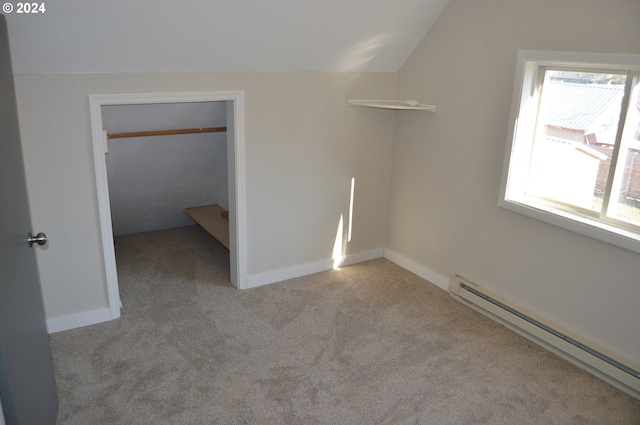 705 Couch Ave, Wallowa, OR 97885 - bonus room featuring baseboard heating, carpet, vaulted ceiling, and baseboards