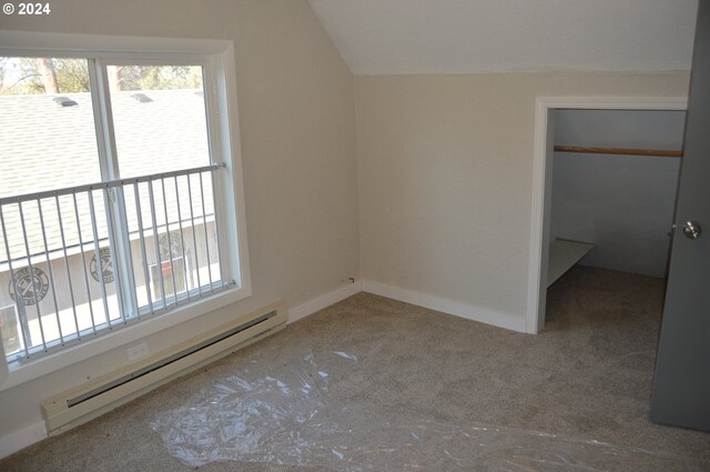 705 Couch Ave, Wallowa, OR 97885 - bonus room with a baseboard heating unit, carpet flooring, and vaulted ceiling