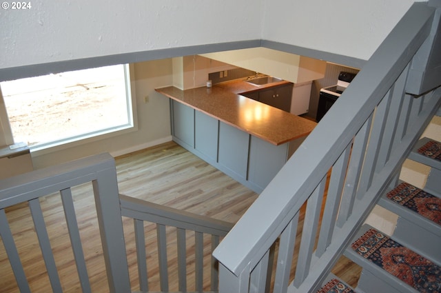 705 Couch Ave, Wallowa, OR 97885 - stairs with wood finished floors and baseboards