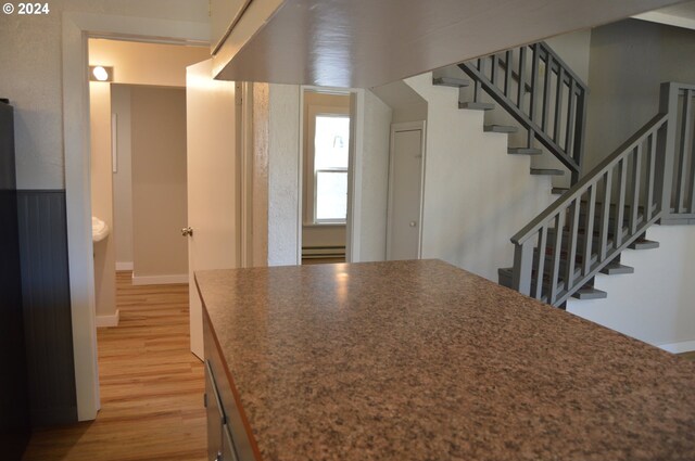 705 Couch Ave, Wallowa, OR 97885 - kitchen featuring wood finished floors and baseboards