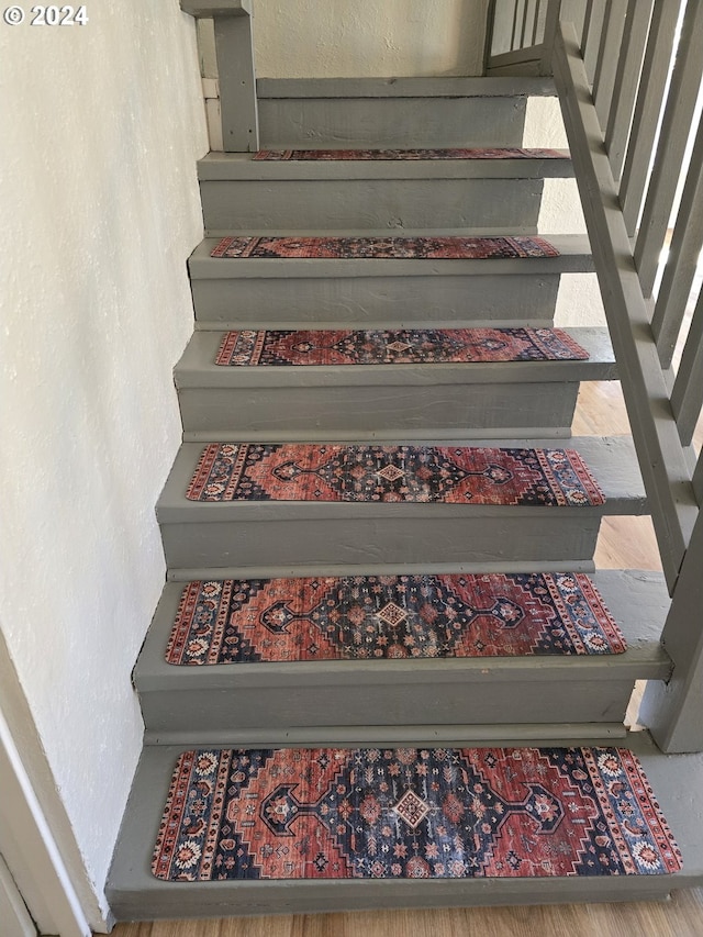 705 Couch Ave, Wallowa, OR 97885 - staircase with a textured wall
