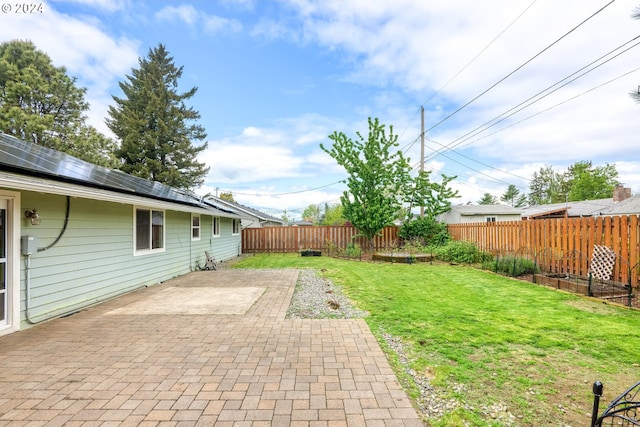 view of yard with a patio area