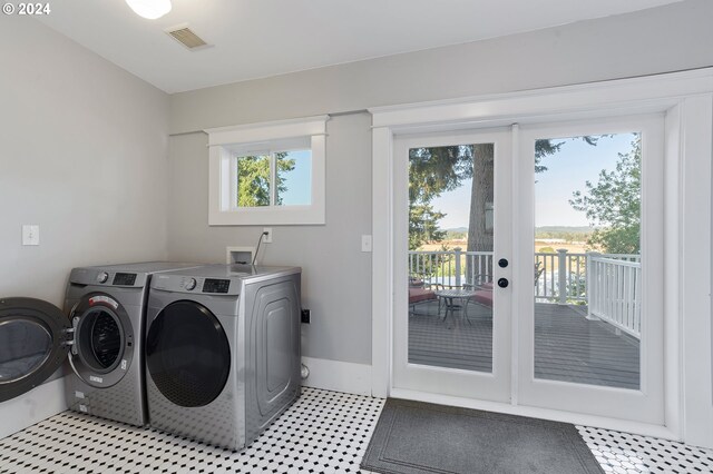 laundry room featuring laundry area, visible vents, and washer and dryer