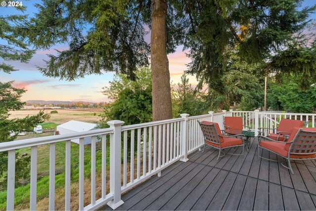 view of deck at dusk