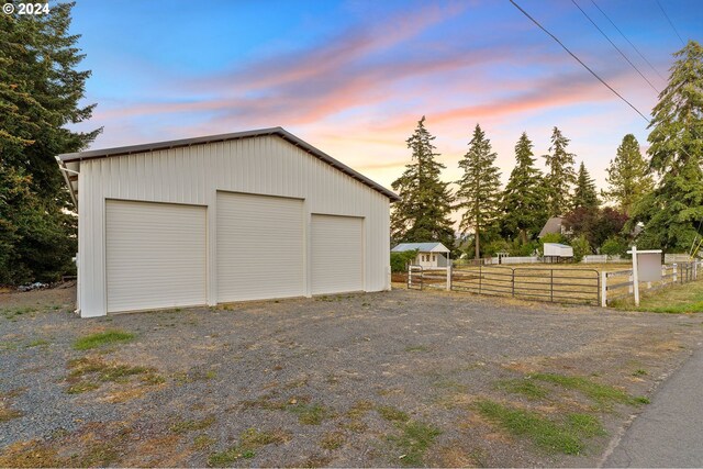 detached garage with fence