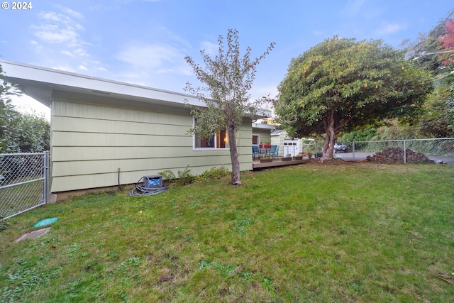 view of yard with a wooden deck