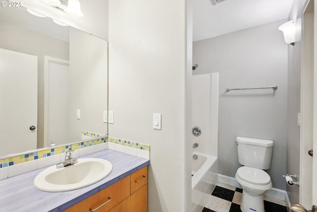 full bathroom featuring washtub / shower combination, vanity, and toilet