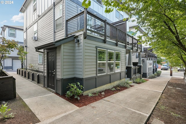 view of property exterior featuring a balcony