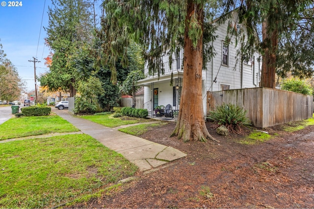 view of yard featuring a porch