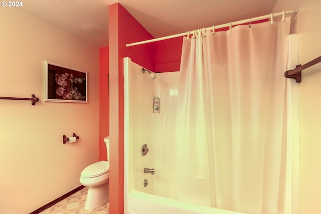 bathroom with tile floors, shower / bath combination with curtain, and toilet