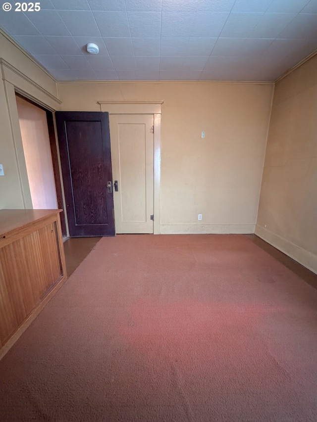 empty room with carpet flooring