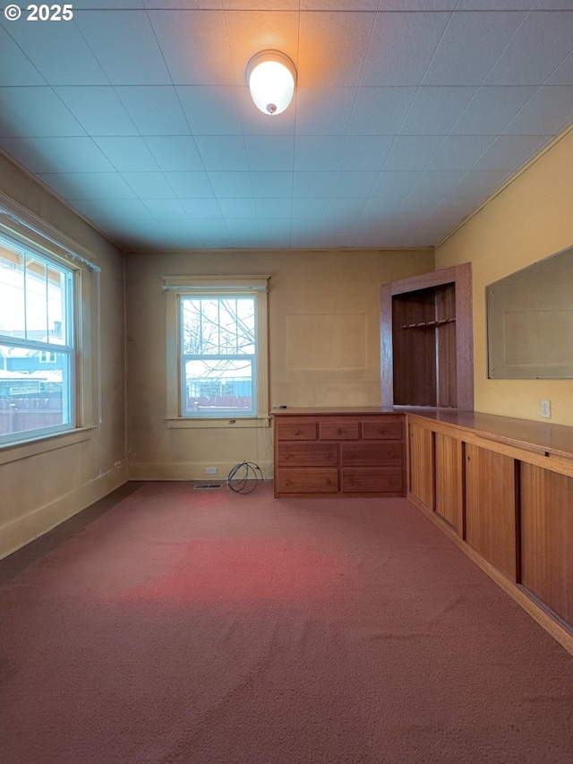 spare room featuring carpet flooring