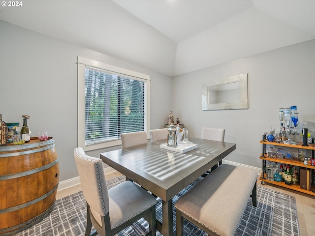 dining space with hardwood / wood-style flooring