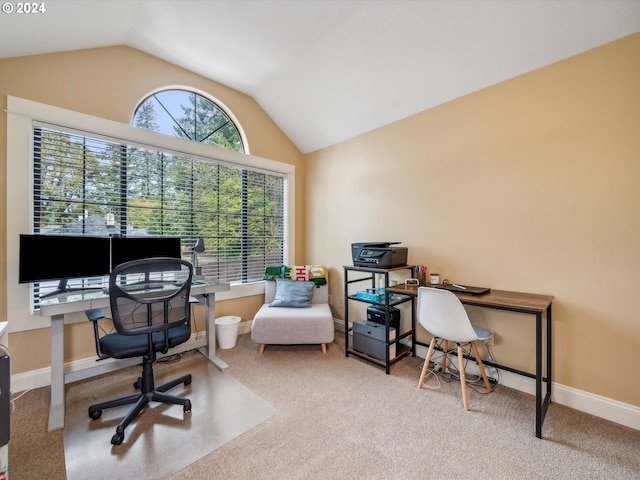 carpeted office space with lofted ceiling