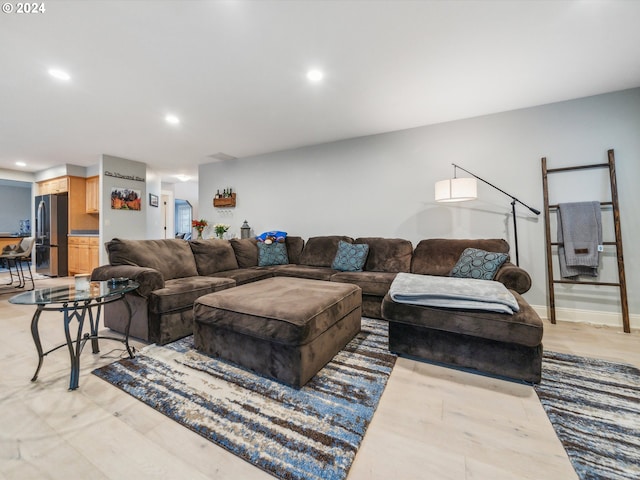 living room with light hardwood / wood-style floors