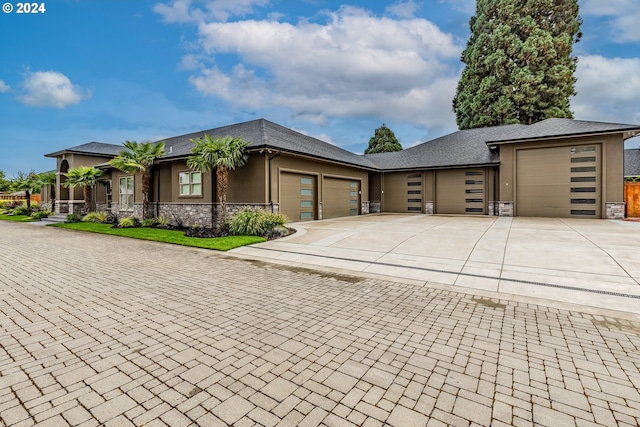 view of front of property featuring a garage