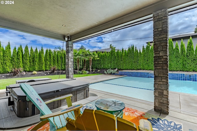 view of pool featuring a hot tub