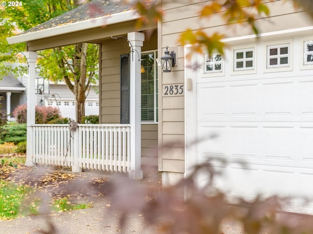 property entrance with a garage