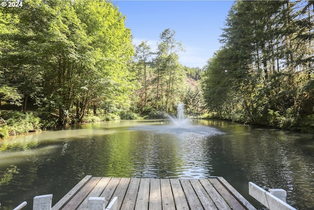 view of dock featuring a water view